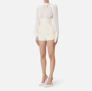 Jumpsuit aus Crêpe und Georgette mit Kreuzschnürmotiv